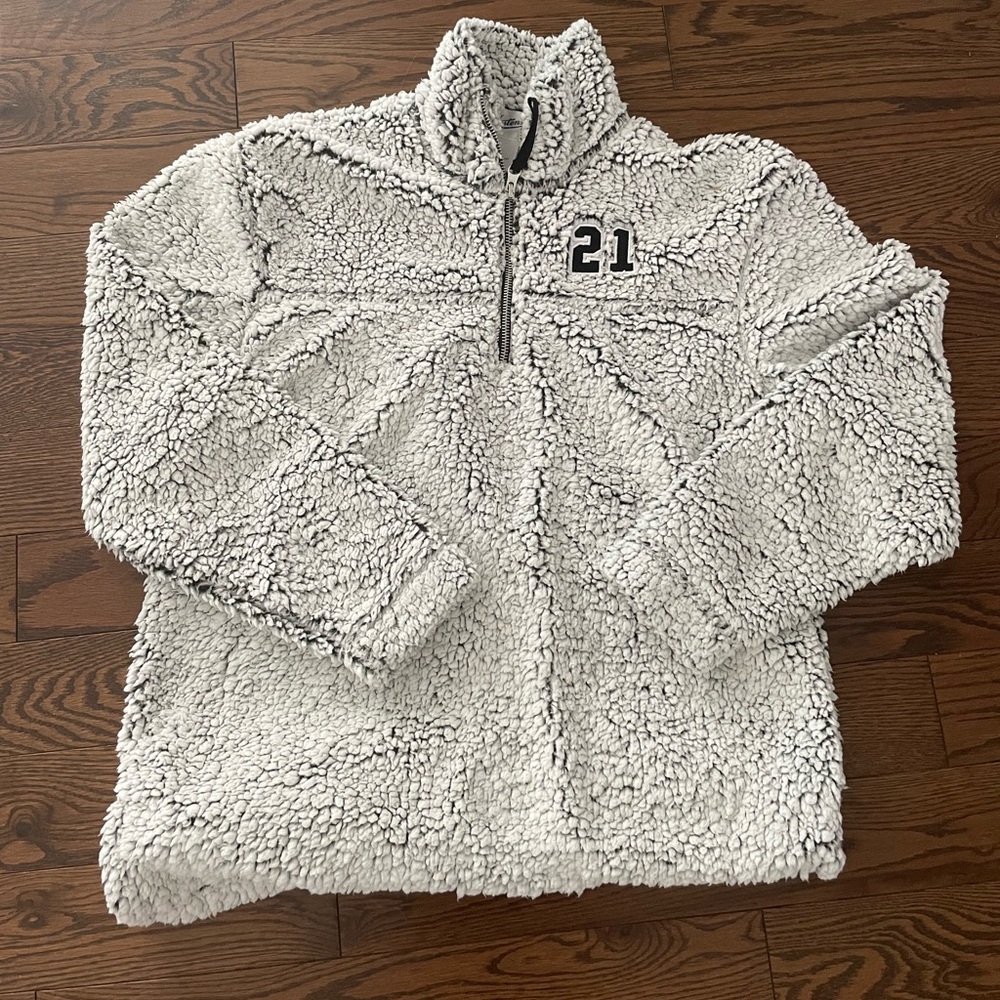 Gray sherpa fleece zip up sweater with "21" embroidery detail